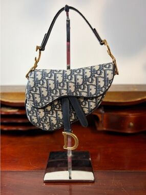 Christian Dior Oblique Jacquard Mini Saddle Bag and guitar strap